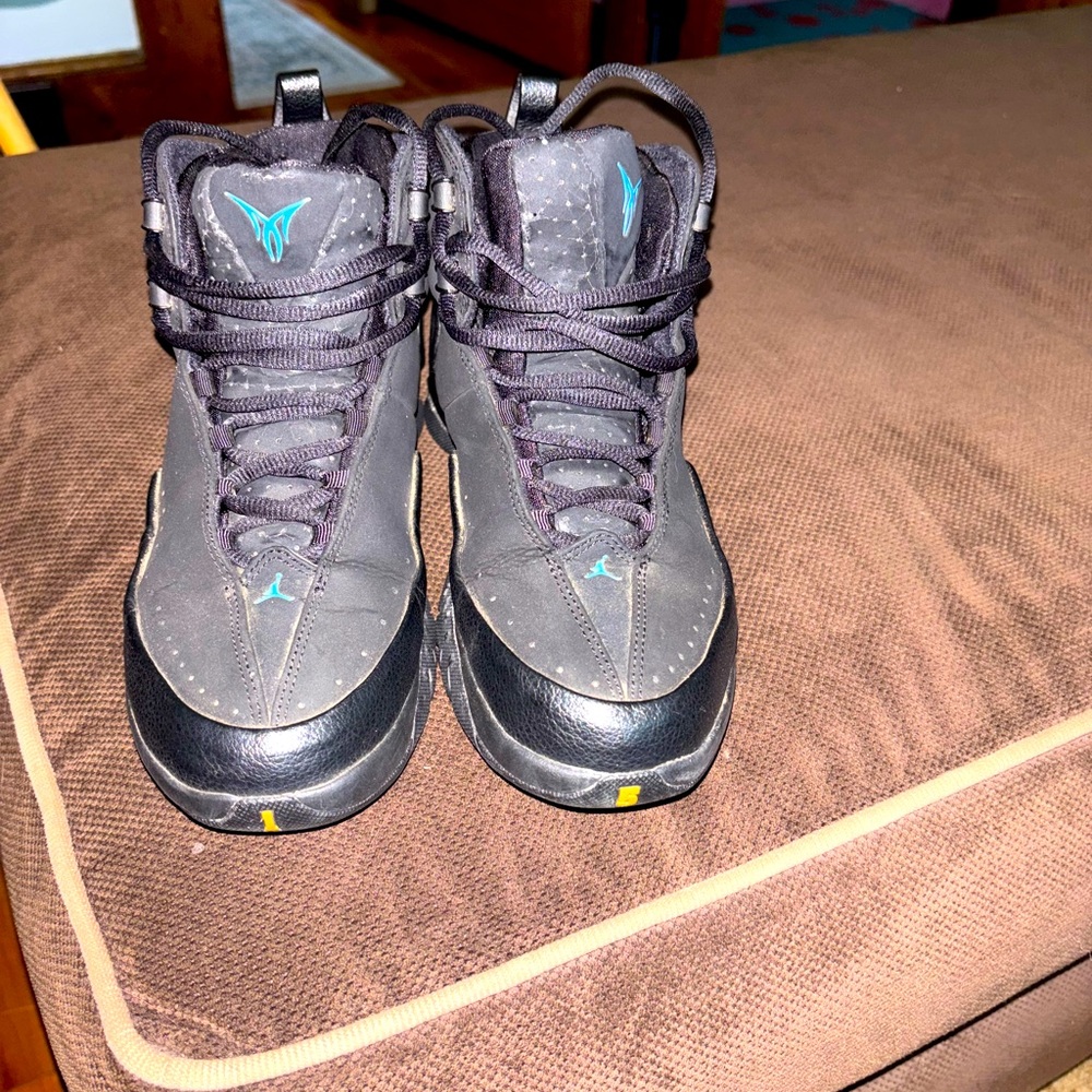 Kids size 5 or women’s size 7/Black and Blue jordans
